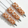 close-up cream heart designer beadable pen showing heart design and beadable barrel