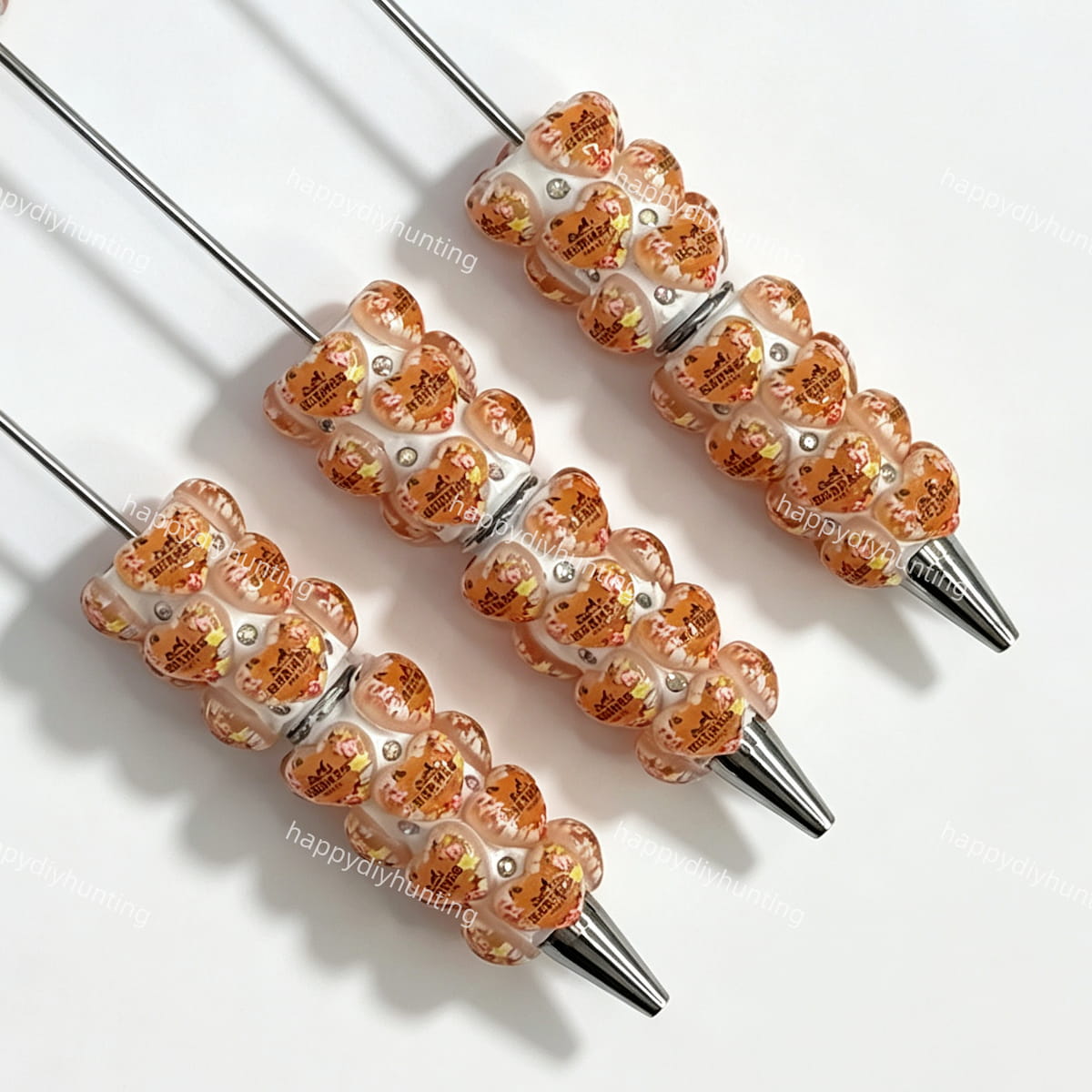 close-up cream heart designer beadable pen showing heart design and beadable barrel