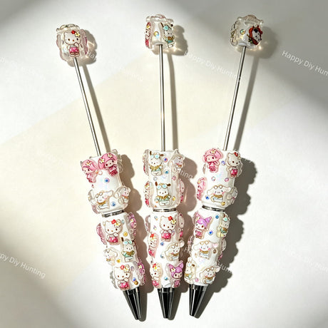 close-up cute character friends beadable pen showing 3D character figurine top and beadable barrel