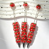 close-up cute strawberry beadable pen showing strawberry design and beadable barrel