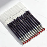 Writing sample of beadable pen refills showing black red and blue ink lines