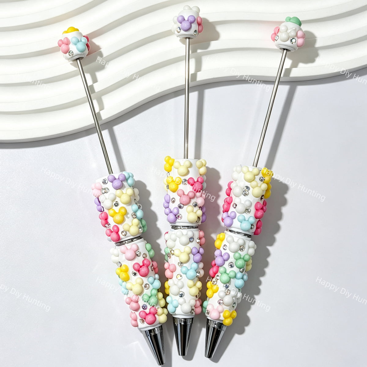 close-up multicolor mouse-head beadable pen showing colorful mouse design and beadable barrel