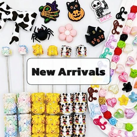 New arrivals collection display of silicone beads, beadable pens, and craft charms.