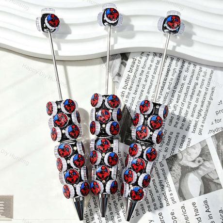 Red Blue Cartoon Hero Print Cartoon Character Beadable Pens closeup of printed silicone bead details on bead pen