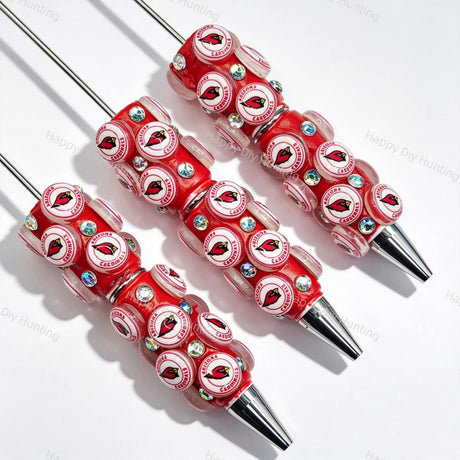 Red bird‑head football emblem sports beadable pens, circular beads printed with red bird‑head patterns and iridescent rhinestones for diy handmade stationery