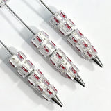 close-up soda can print beadable pen showing beverage can design and beadable barrel