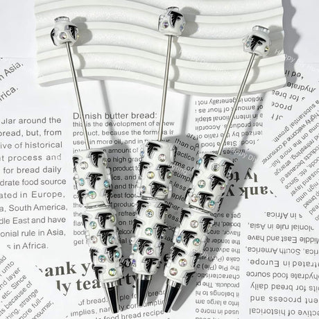 close-up white eagle bird AF football beadable pen showing eagle design and beadable barrel