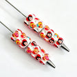 white close-up funny BB cartoon character beadable pen showing funny design and beadable barrel